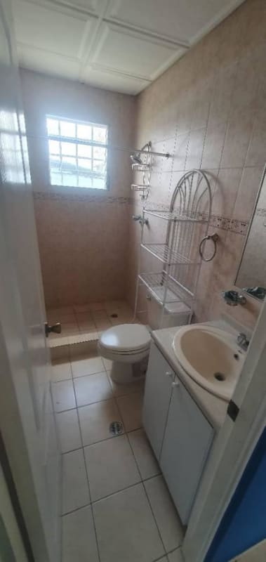 Bathroom with walk-in shower ceramic tiles and window Portofino Villa Zaita Panama
