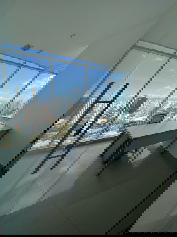 Meeting area with glass walls panoramic city view F&F Tower El Tornillo Panama