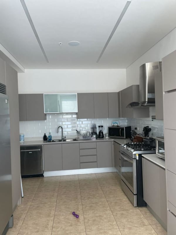 Secondary bedroom with ensuite bathroom, large windows in PH Titanium Costa del Este Panama