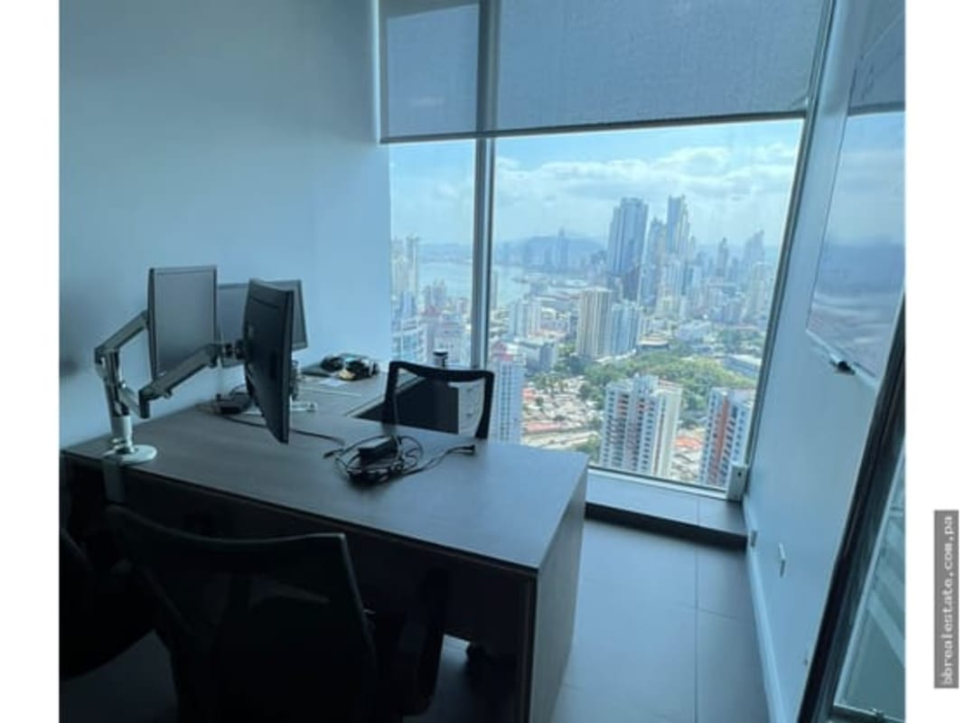 Conference room with panoramic windows overlooking Punta Pacifica skyline in Oceania Business Plaza Panama