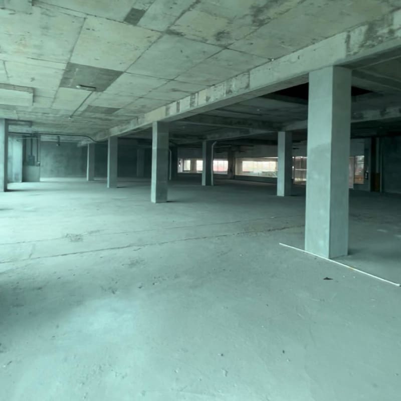 Unfinished interior commercial space with exposed ceiling and columns in Paseo Albrook Panama City