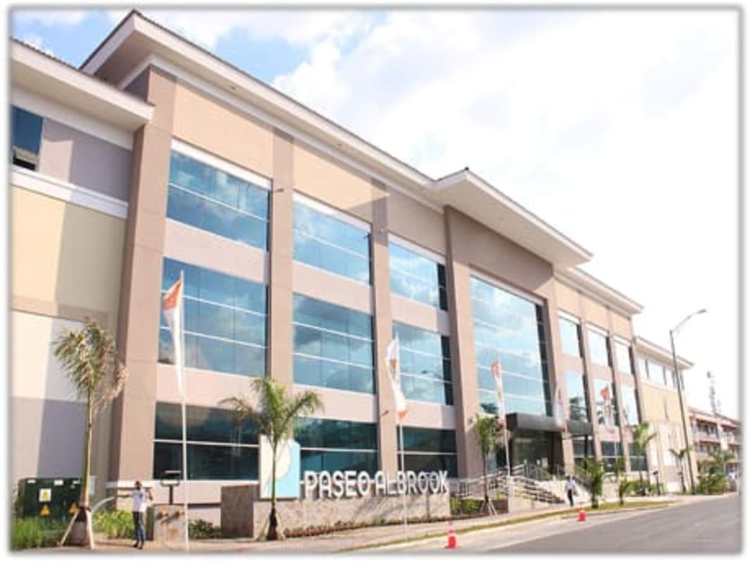 Glass facade of Paseo Albrook Mall modern shopping center commercial storefront available for rent in Panama City