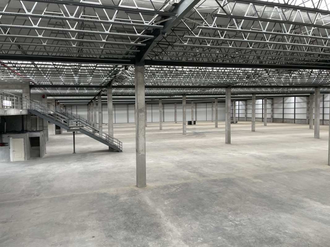 Warehouse with mezzanine natural light insulated wall truck loading area in Don Bosco Panama