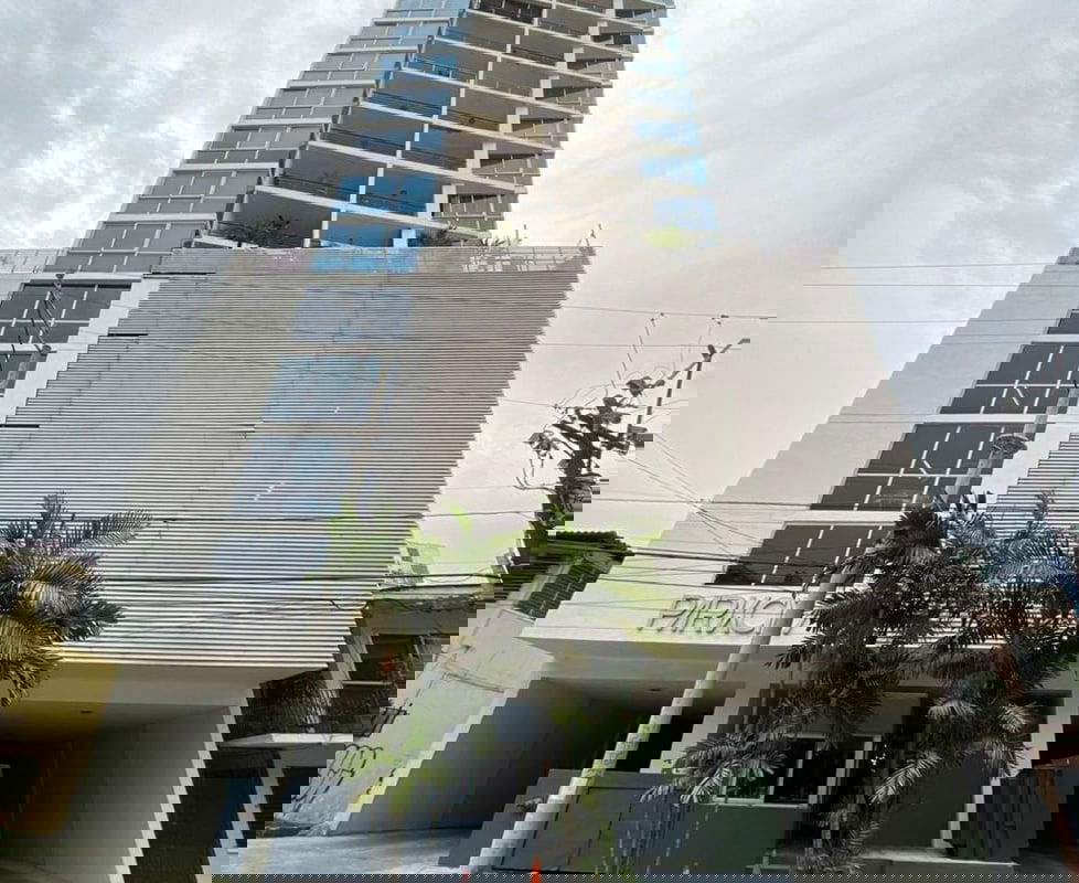 Modern condominium PH Park City exterior with balconies and palm trees in El Cangrejo Panama City