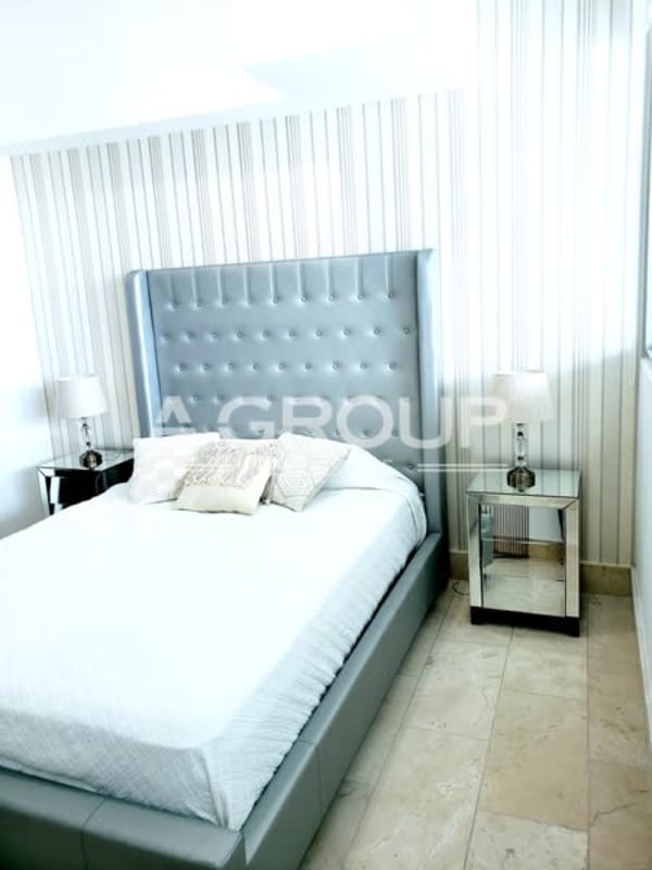 Bedroom with ocean view balcony access, luxury furnishings, Grand Tower Punta Pacifica Panama
