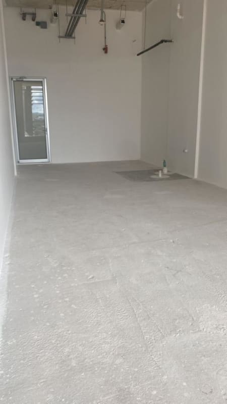 Shell commercial unit with exposed ceiling and rough floors at Costa del Este