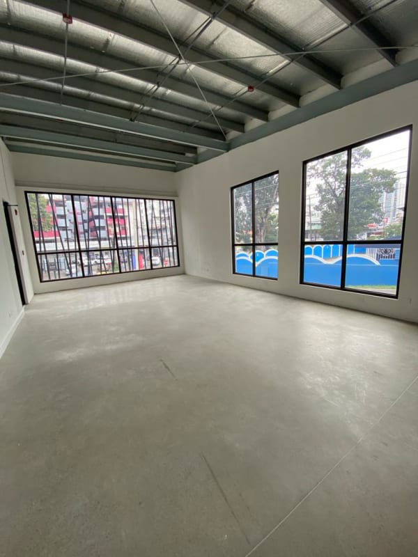 Contemporary two-story commercial plaza with retail spaces and parking Río Abajo Panama
