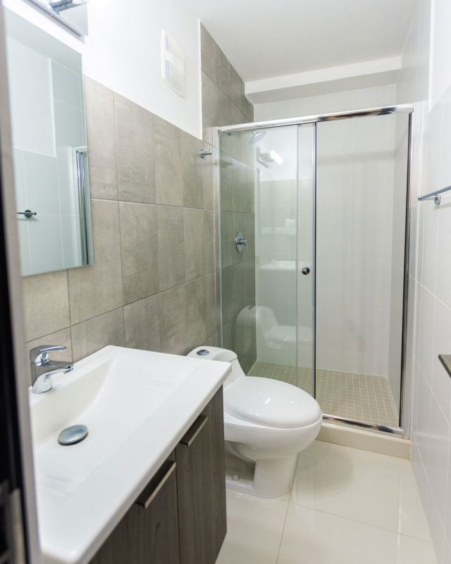 Colorful children's outdoor play area on rooftop terrace PH Carrasquilla Park Tower Panama