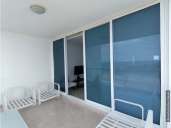 Second bedroom overlooking pool and gardens in Ocean II condo Playa Blanca Panama