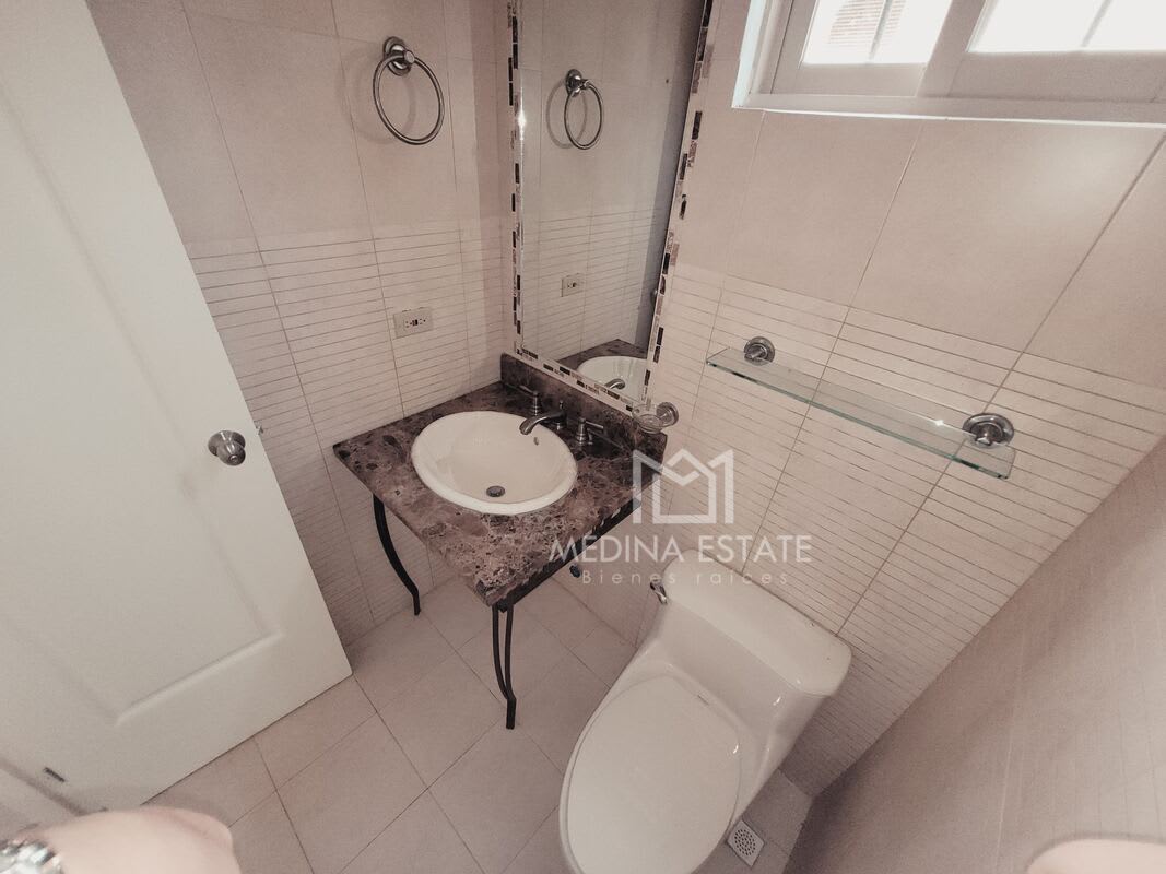 Bright bathroom with corner bathtub, double vanity, skylight Embassy Gardens Clayton Panama
