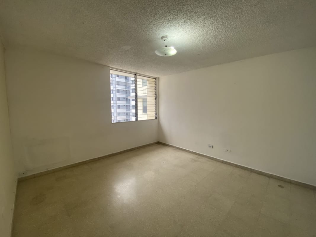 Unfurnished bedroom with large window and skyline views PH Monaco in Obarrio Panama