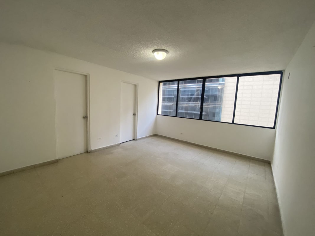 Large empty space with beige tile floor and natural light PH Monaco Obarrio