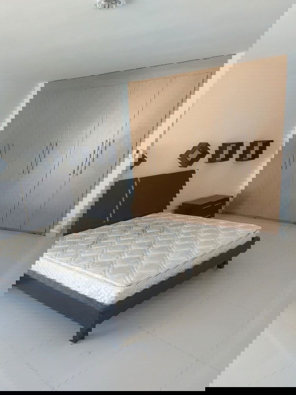 Bedroom with large window, garden view, AC split and two single beds in Costa Sur Panama