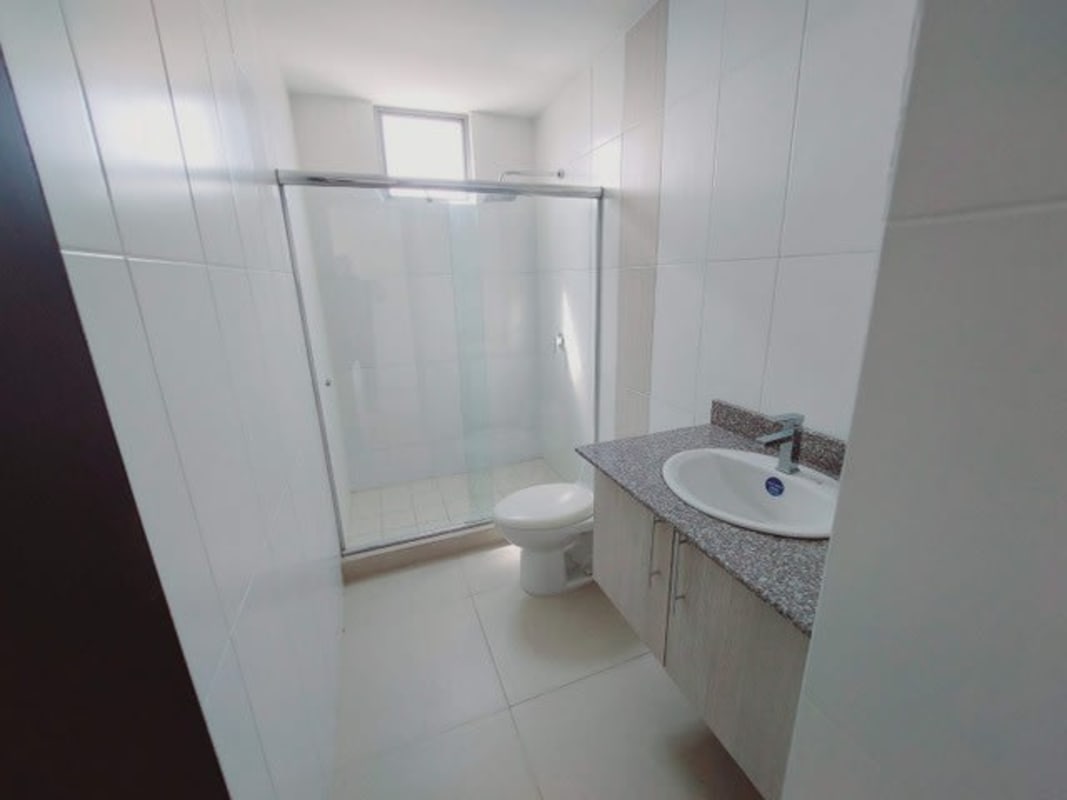 Modern kitchen with granite countertop and light cabinetry in PH Alta Terra Panama