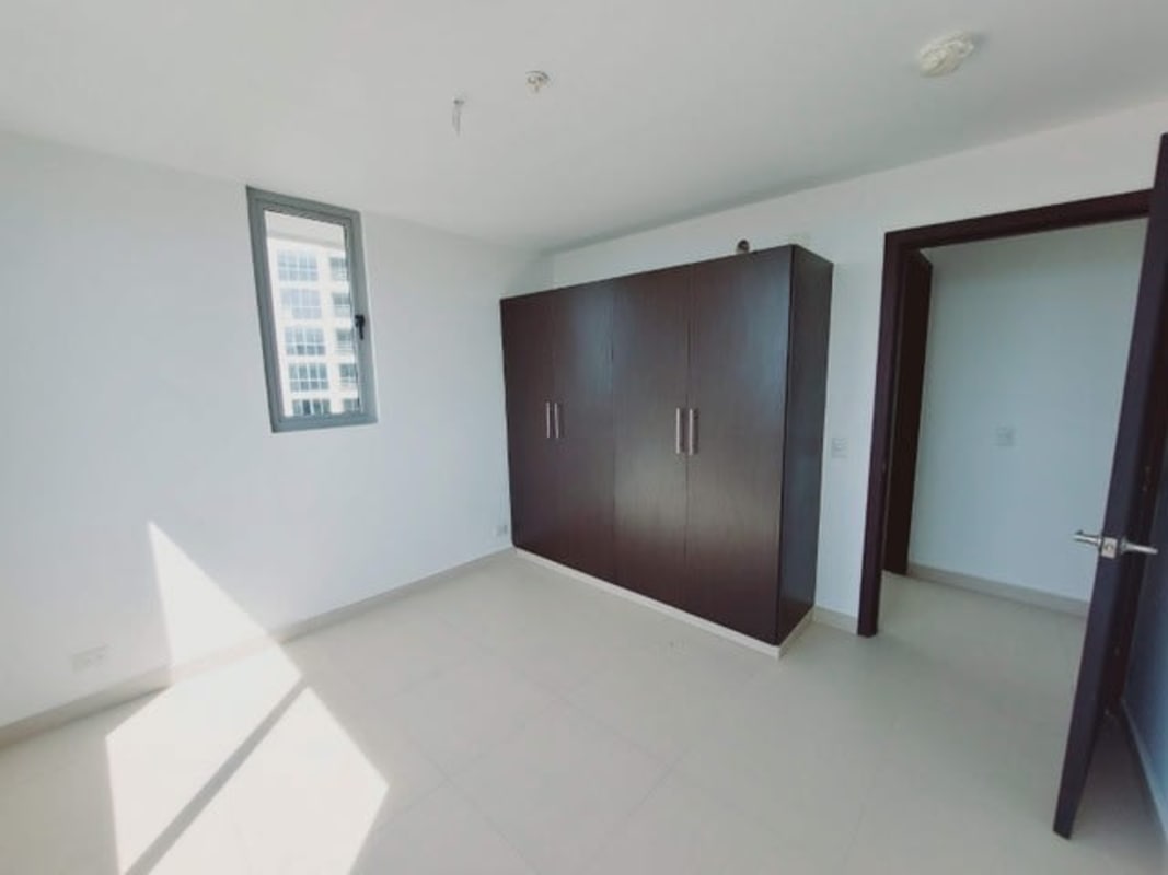 Modern bright living dining area with balcony and tile floor at PH Alta Terra Panama