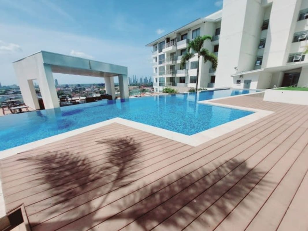 Modern bathroom with glass shower enclosure granite countertop cabinet PH Alta Terra Panama