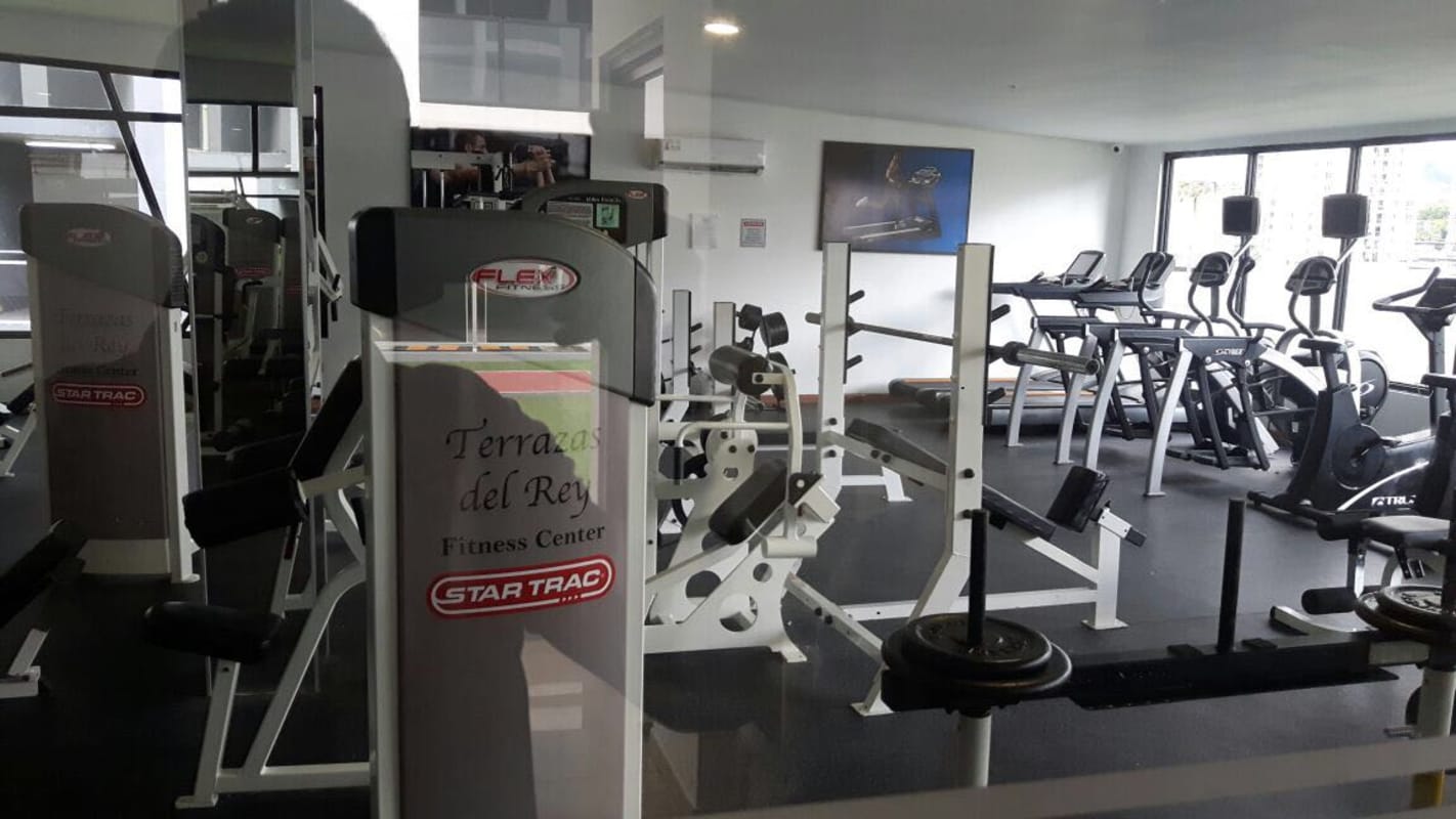 Exterior of PH Terrazas del Rey modern high-rise with balconies and parking in Condado del Rey Panama