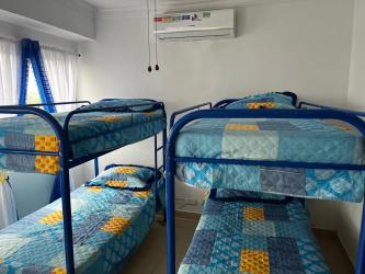 Oceanfront master bedroom with balcony access and panoramic views at Playa Blanca Panama