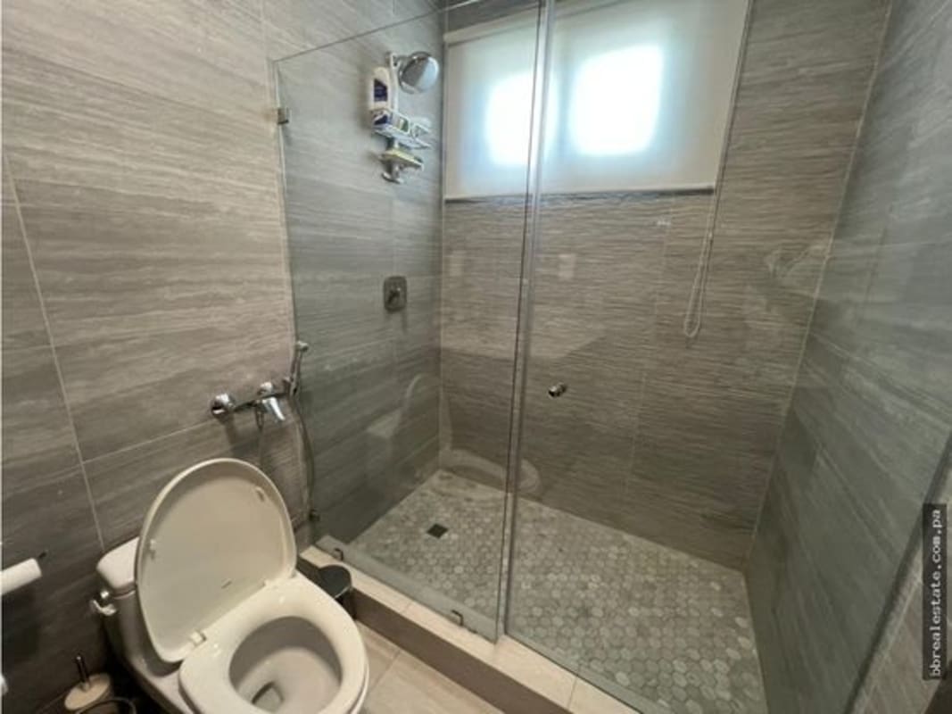 Bathroom with glass-enclosed shower, designer sink and quality finishes in PH Parkview Costa del Este
