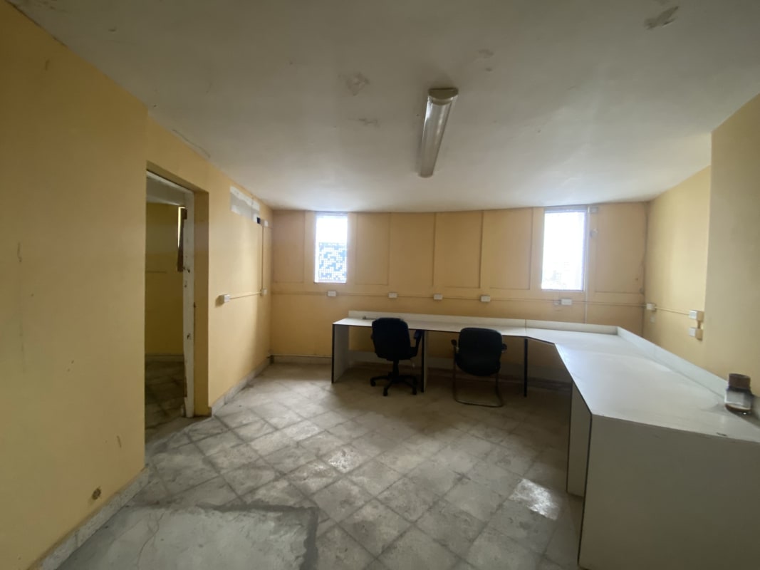 Partitioned individual office cubicles Plaza 50 commercial tower Panama City