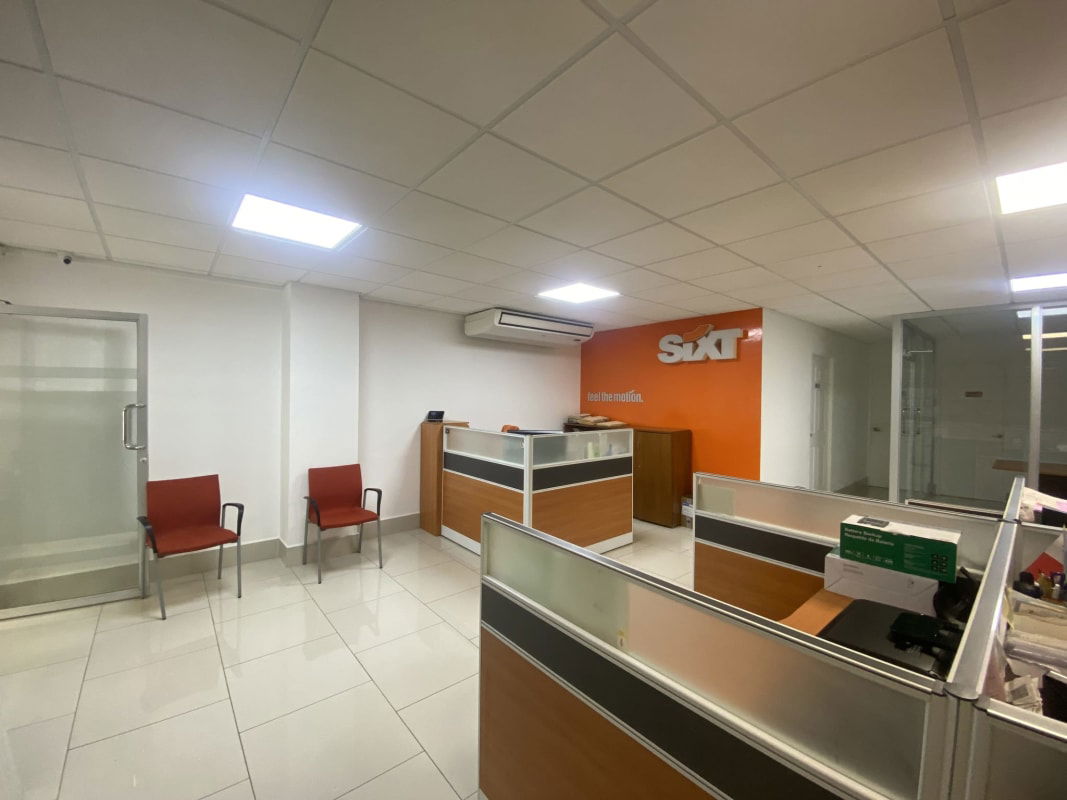 Modern private office room with desk chair white walls PH El Cangrejo Business Complex Panama