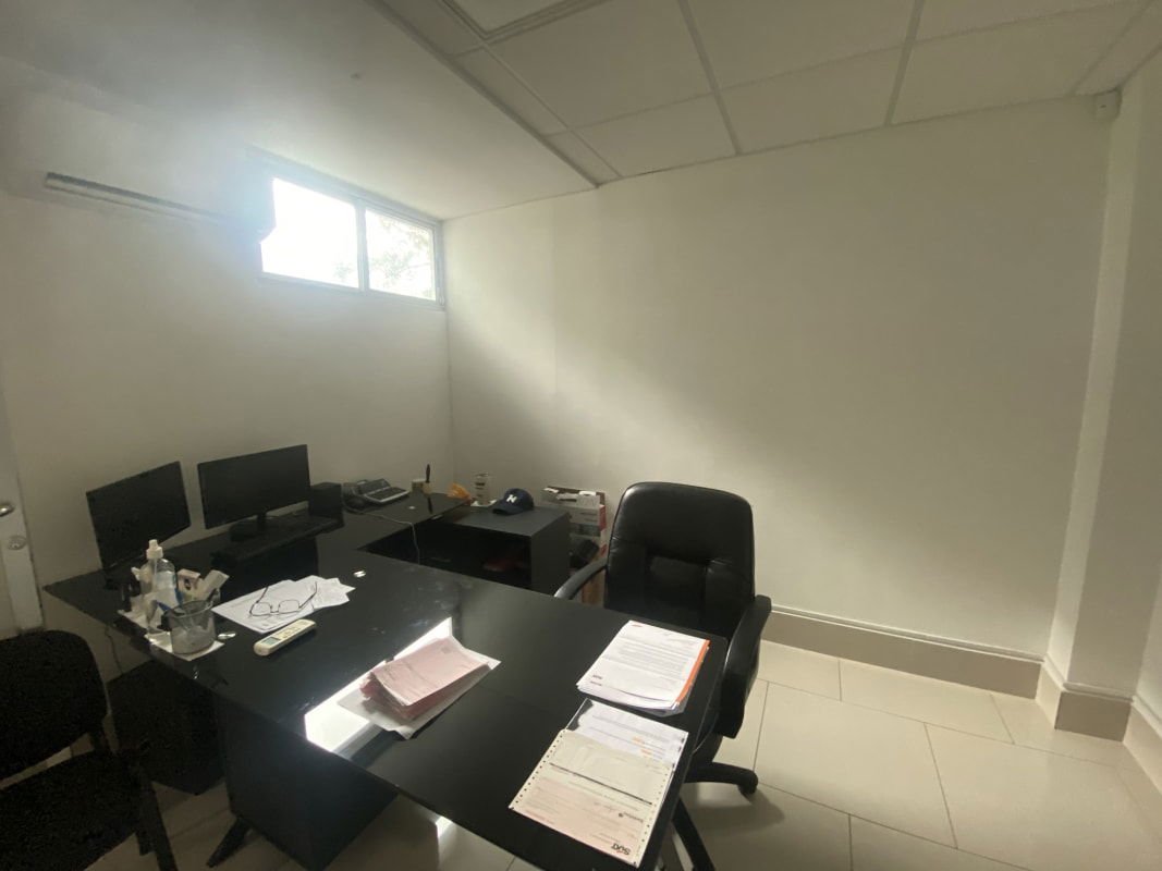 Cozy office with desk monitors AC window tiled floor PH El Cangrejo Business Complex Panama