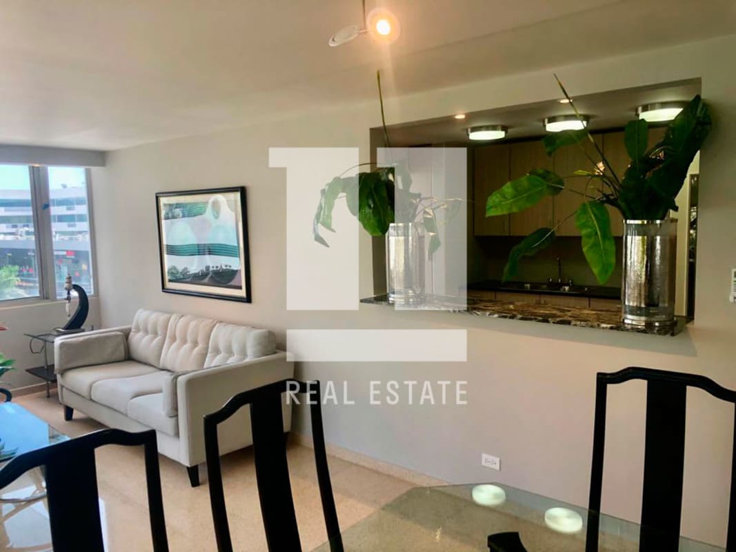 Kitchen with granite counters and wood cabinets PH Parque Marbella Marbella Panama