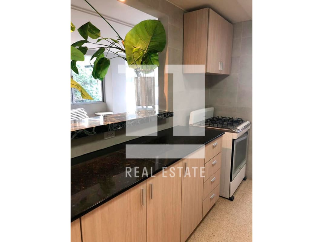 Updated kitchen with granite counters cabinets Panama apartment sale