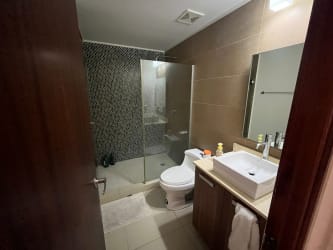 Modern bathroom with tile accents and vessel sink PH River Valley Panama