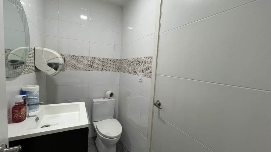 Spacious meeting room with large table and windows in commercial Punta Pacifica skyscraper