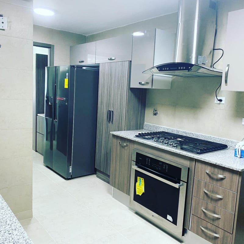 Elegant two story lobby with marble finishes at PH Lumiere Costa del Este Panama City