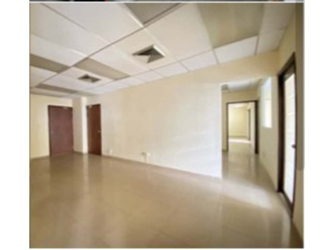 Commercial office interior with tiled floor, glass wall partitions and doors in PH Interseco Bella Vista Panama