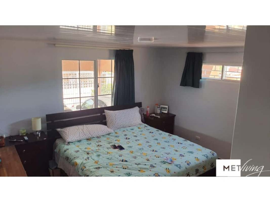 Master bedroom dual windows AC blackout curtains Cerro Viento San Miguelito Panama