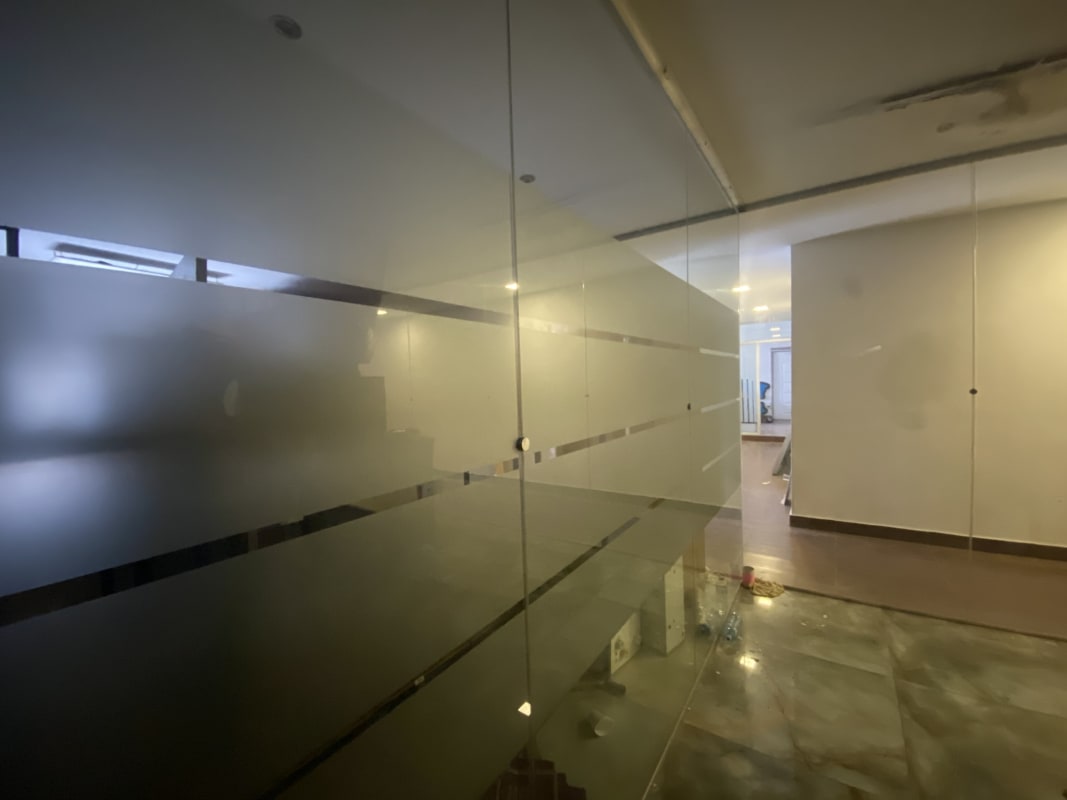 Entrance with frosted glass partition and lighting Parque Industrial Costa del Este