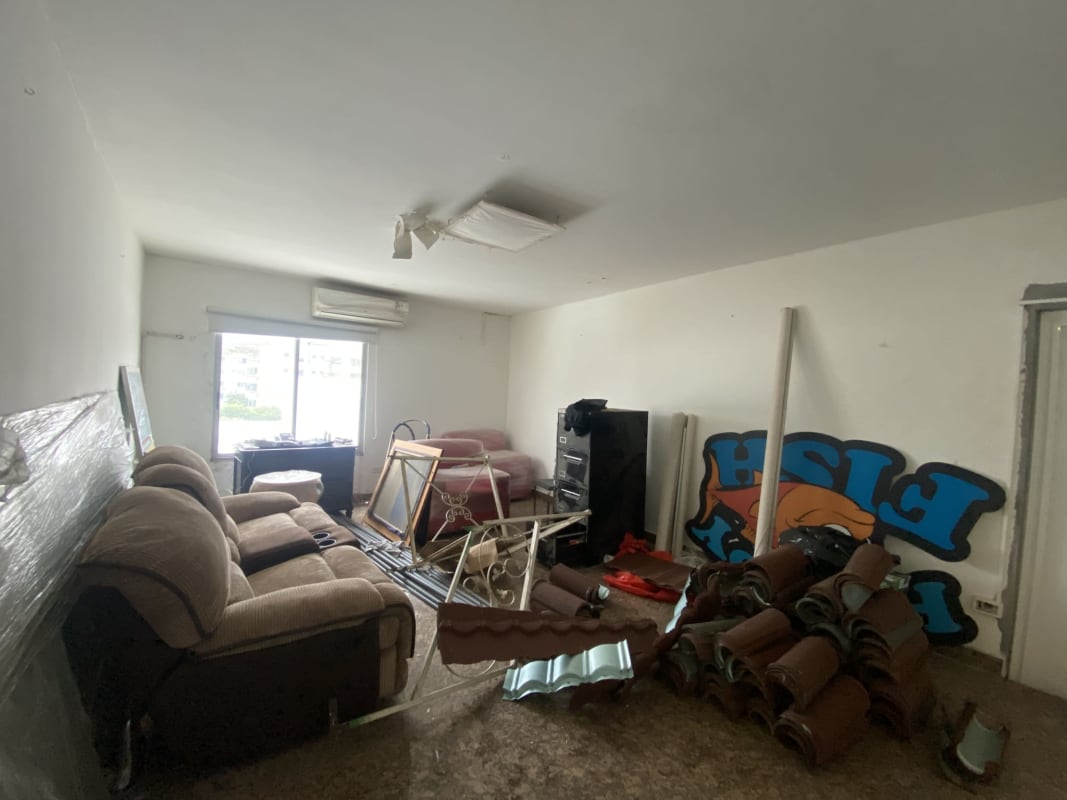 Private glass-enclosed office spaces with marble floors Costa del Este