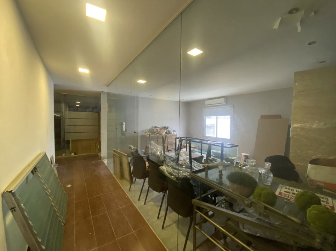 Commercial space with large window glass wall marble floor Costa del Este