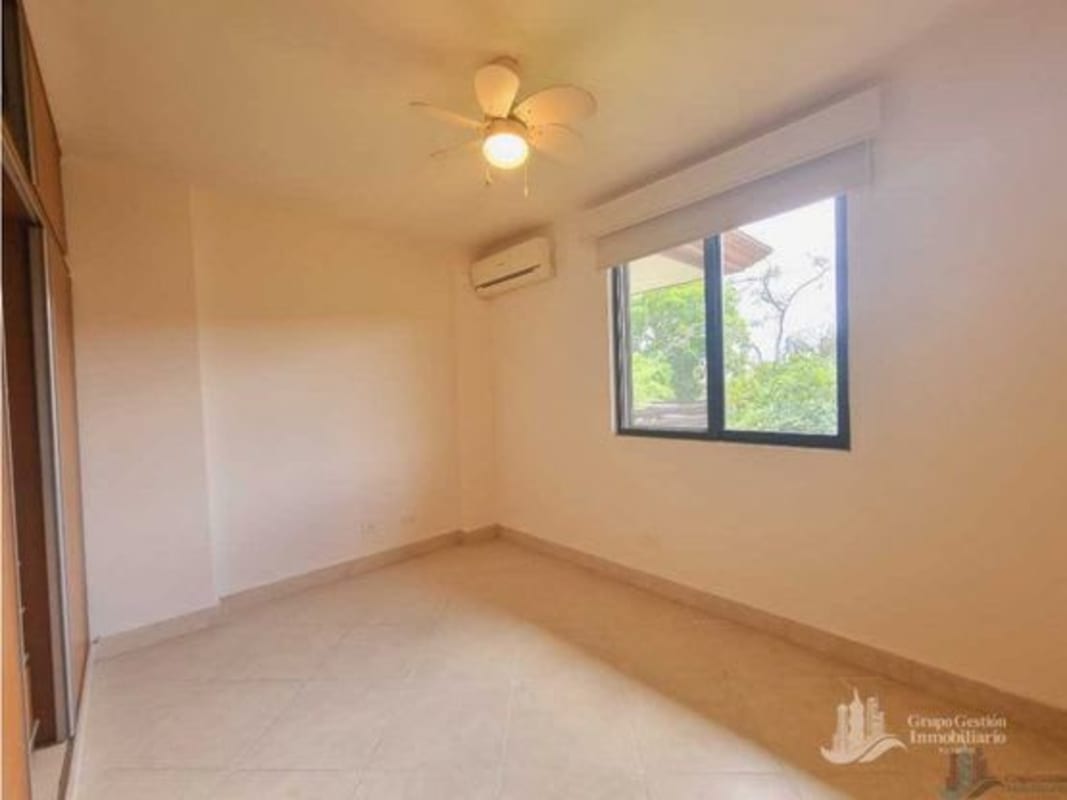 Bedroom with built-in closets and garden view in luxury apartment Clayton Panama