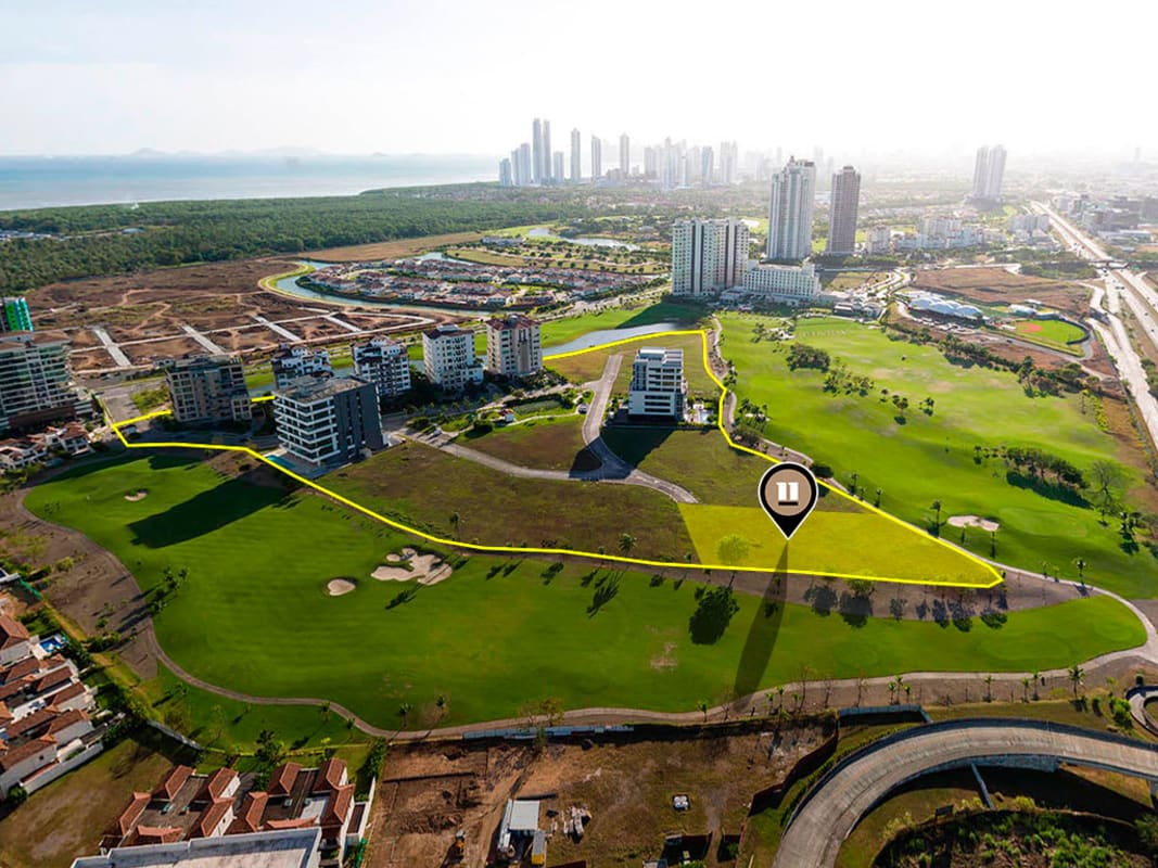 Aerial view of golf course, urban skyline and ocean in Panama City from Santa María development land