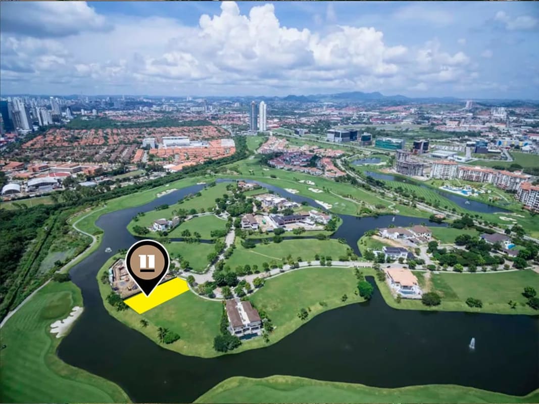 Panoramic aerial showing golf course, lakes, upscale homes, skyline of Panama City around Santa María