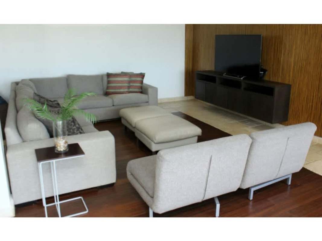Luxurious living area with sea views, contemporary furniture in Punta Paitilla Panama home