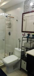Bathroom with hot water shower, ceramic sink at Bala Beach Resort vacation rental Panama