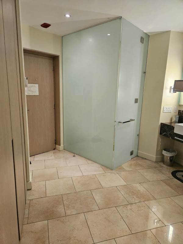 Bathroom with double sinks, glass-enclosed shower, contemporary fixtures PH The Ocean Club Punta Pacífica