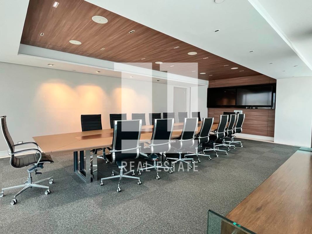 Contemporary meeting room with TV, artwork, lighting at Torre BMW Panama