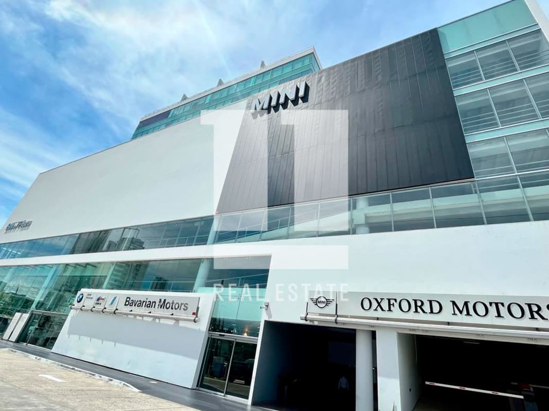 Elegant lobby with abstract art, marble reception, glass entrance in BMW Tower Calle 50 Panama