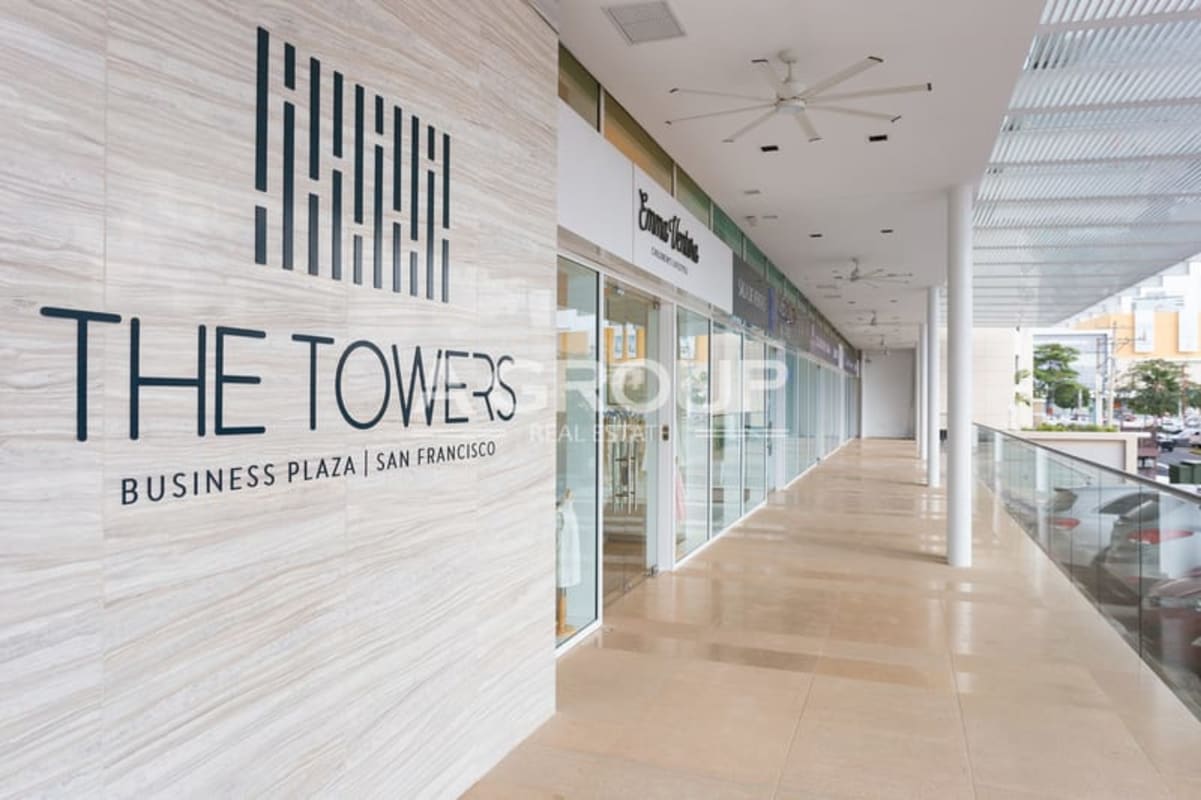 Interior raw open area with skyline view windows in The Towers Calle 50