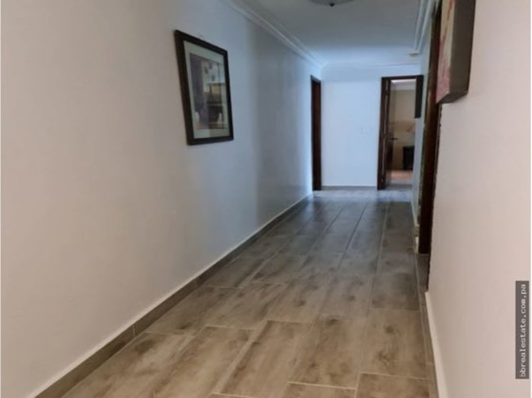 Laundry room with washer dryer hookups and cabinets at Sunrise Tower Obarrio Panama City