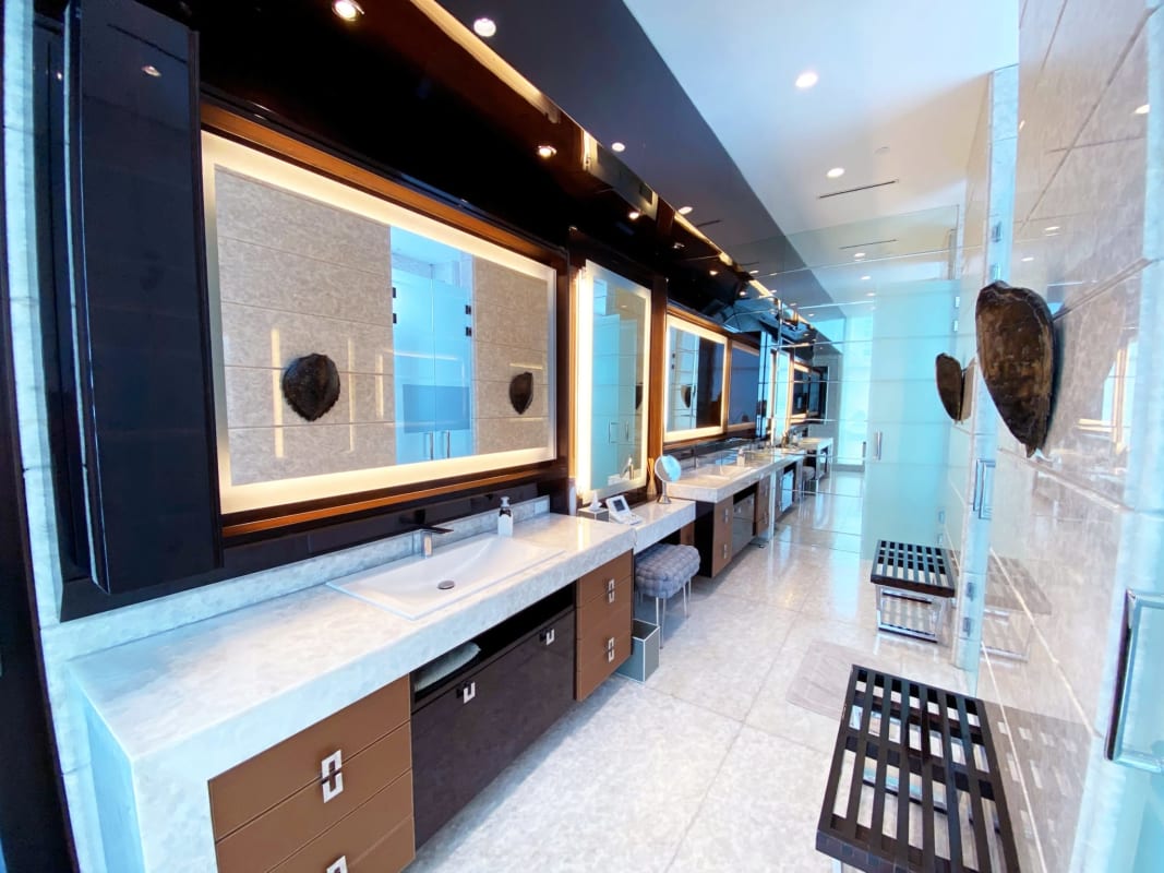 Luxury kitchen with marble counters, island, premium appliances in Pacific Point penthouse Panama City