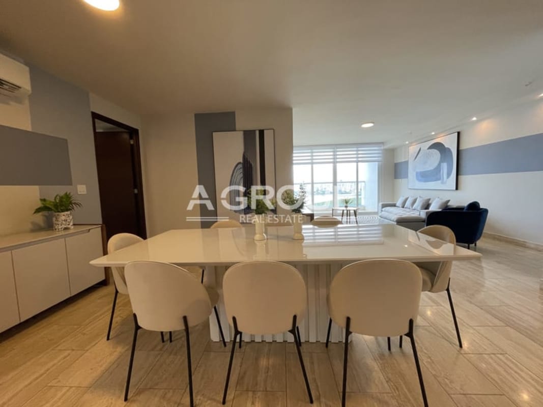 Spacious open-plan living and dining area with modern furnishings at The Regent Costa del Este