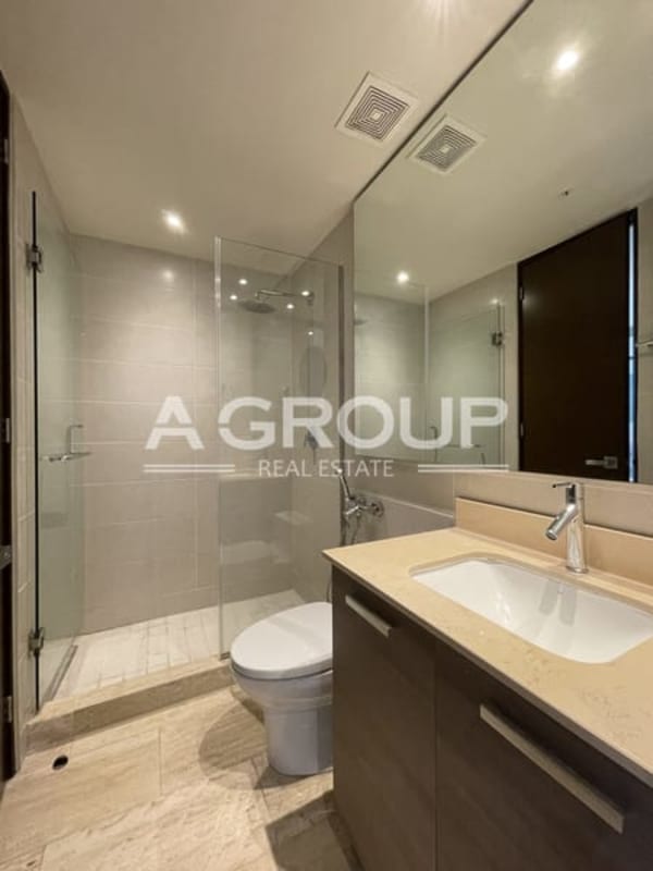 Master bedroom with panoramic city windows in The Regent Costa del Este Panama