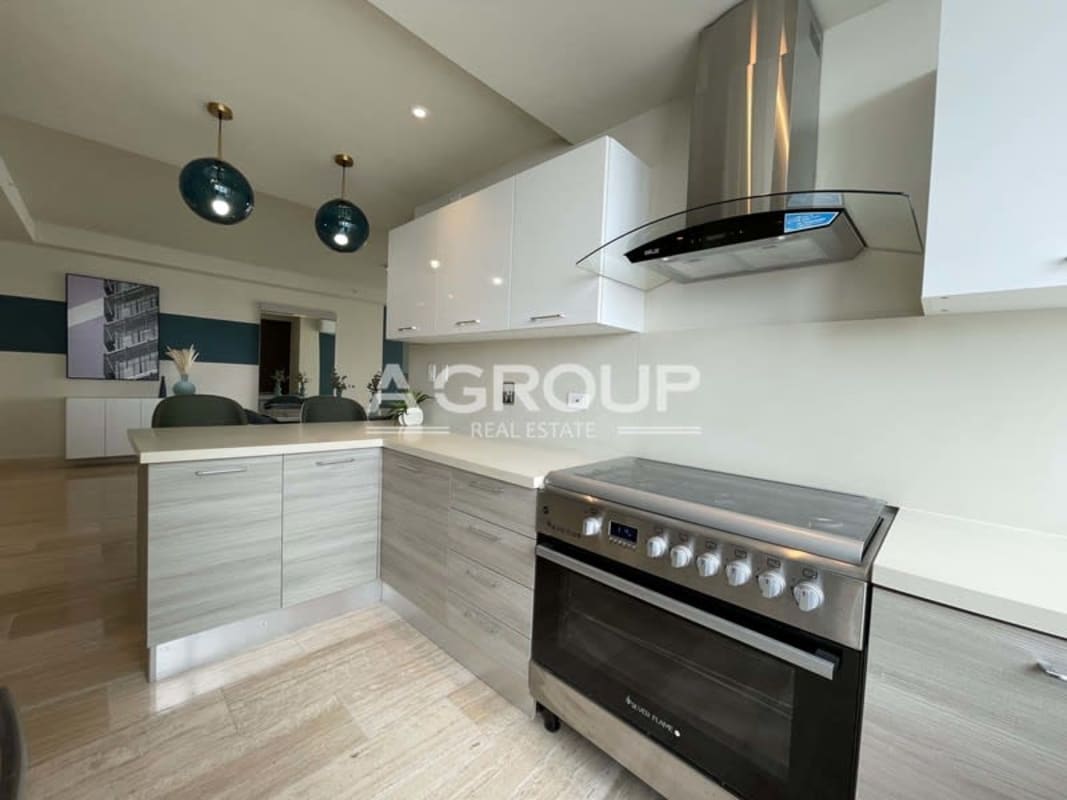 Glass railing balcony overlooking ocean and skyline in PH The Regent Costa del Este Panama